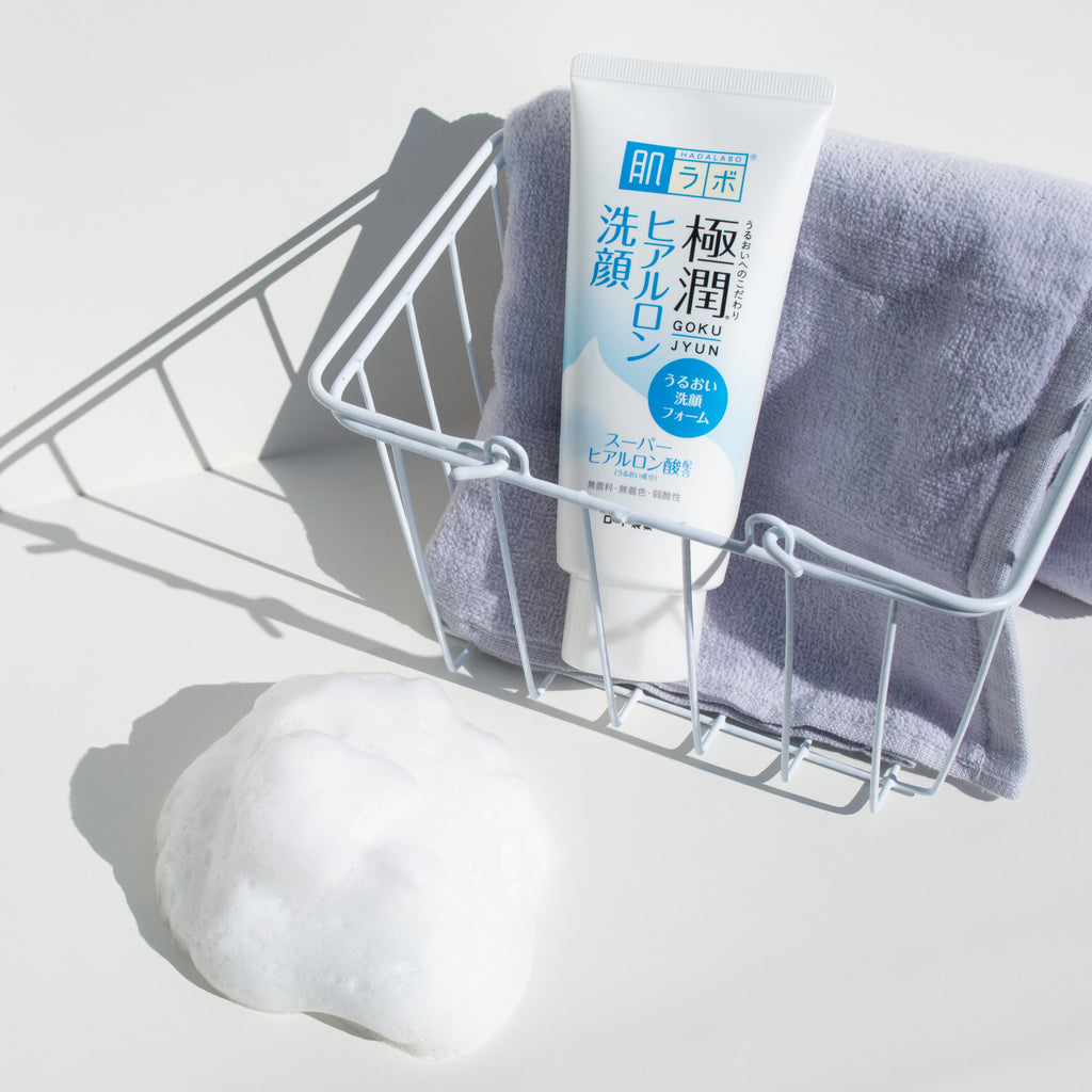 Hada Labo Gokujyun Hyaluronic Acid Foaming Cleanser in a white basket with foam lifestyle stylish photo on white background product review 肌ラボ 極潤 ヒアルロン洗顔フォーム